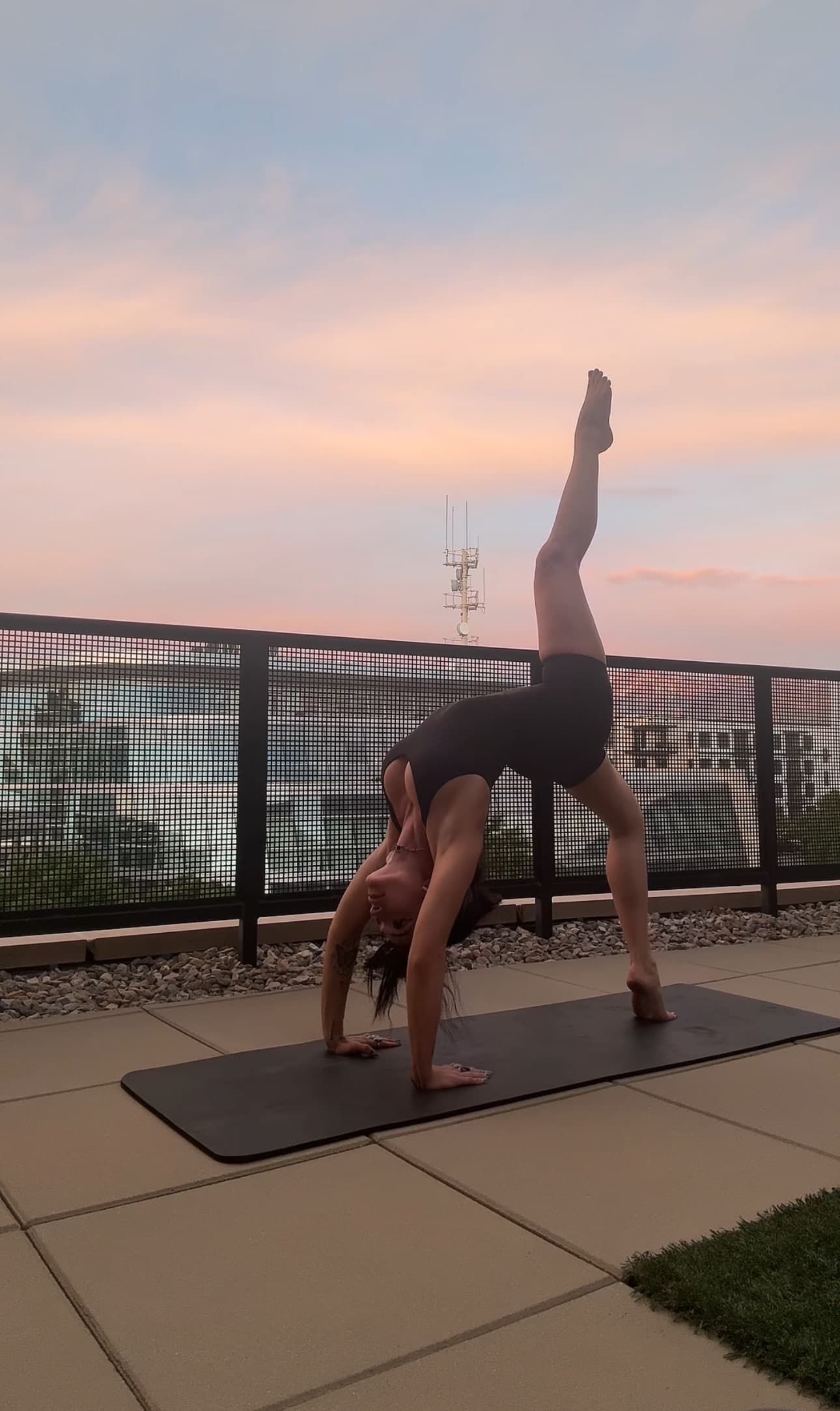 Blaire doing rooftop yoga